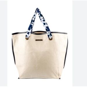 Oscar De La Renta straw beach bag duplicate listing